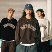 Tvöfaldur rúskinnsútsaumaður peysa